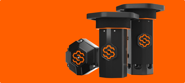 The three original SiteHive Hexanode devices: the compact hexagonal Vibration puck, and the column-style Noise and Noise+Dust devices with large round weather caps on top.