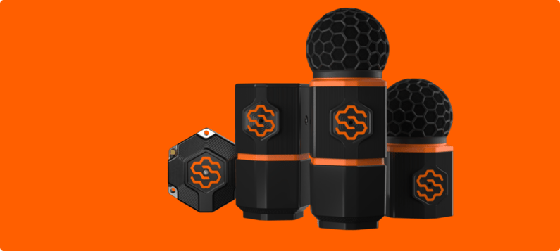 The SiteHive Hexanode device family: the compact Vibration puck, the flat-topped Dust column, and the Noise+Dust and Noise devices with spherical black foam windshields.